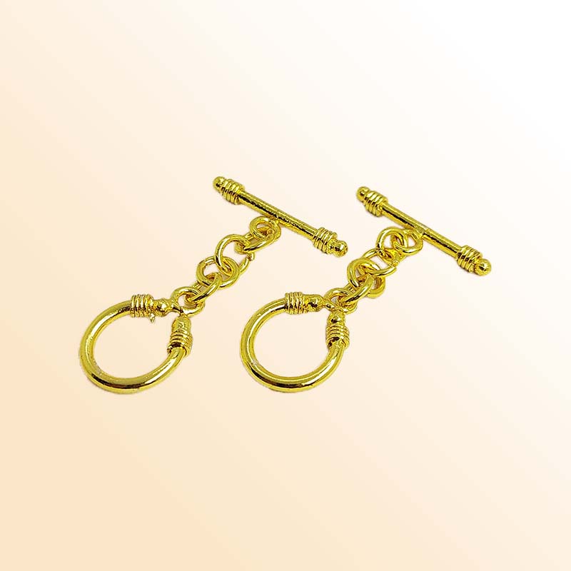 Handmade 18K gold overlay toggle clasp with polished decorative loop and elongated bar, crafted in India for bracelets and necklaces