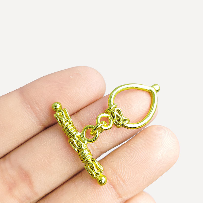Handmade 18K gold overlay toggle clasp with ornate decorative bar and teardrop loop, crafted in India for bracelets and necklaces