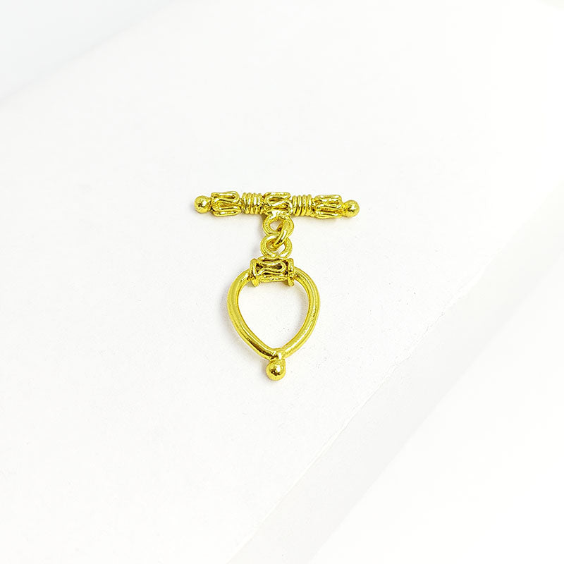 Handmade 18K gold overlay toggle clasp with ornate decorative bar and teardrop loop, crafted in India for bracelets and necklaces