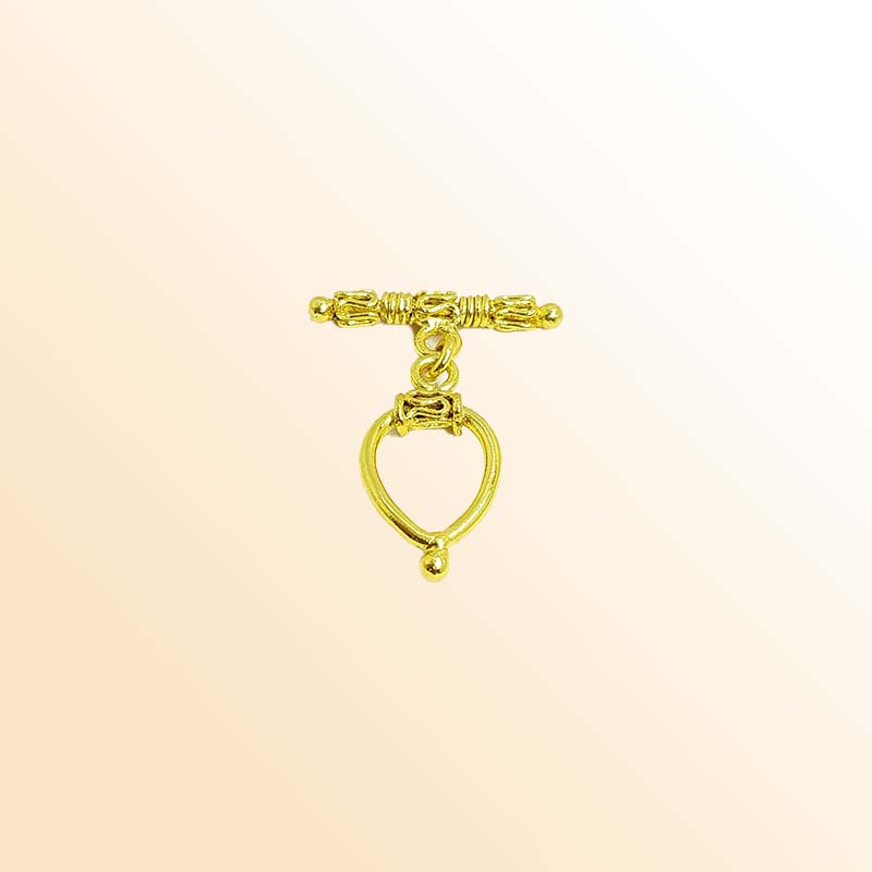 Handmade 18K gold overlay toggle clasp with ornate decorative bar and teardrop loop, crafted in India for bracelets and necklaces