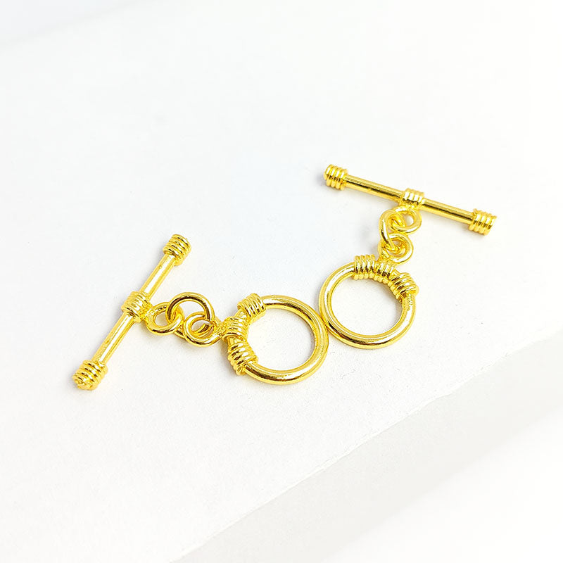 Stylish 18K gold overlay wire-wrapped toggle clasp with round ring and bar design, handcrafted in India, perfect for bracelets and necklaces.