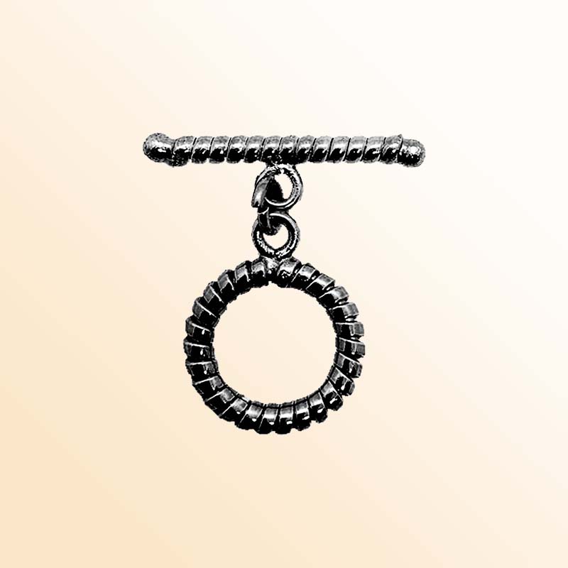 Handcrafted Black Rhodium Overlay toggle clasp from India with textured circular ring and twisted bar design.