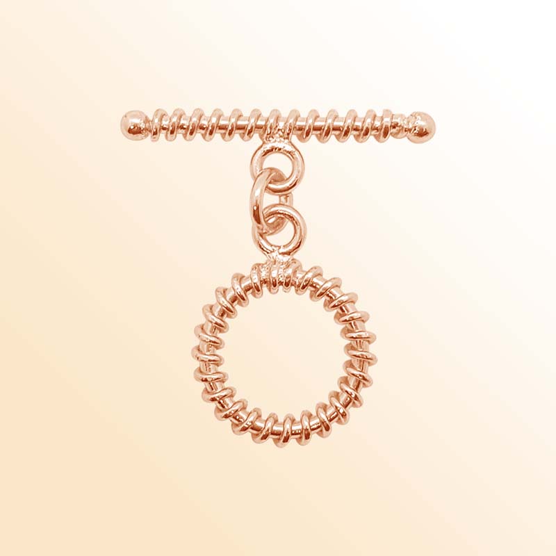 Rose Gold Overlay toggle clasp from India with textured circular loop and decorative bar.