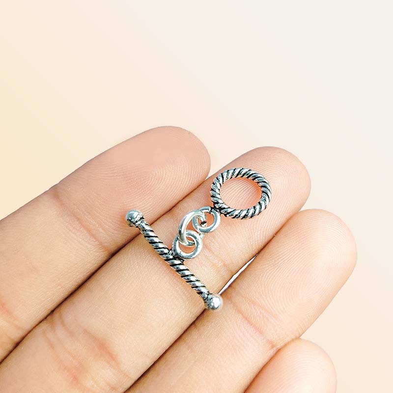 Decorative Silver Overlay toggle clasp with twisted rope pattern, round loop and bar design, oxidized finish, artisan jewelry fastener for necklaces and bracelets.