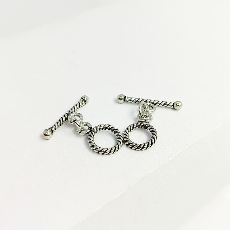 Decorative Silver Overlay toggle clasp with twisted rope pattern, round loop and bar design, oxidized finish, artisan jewelry fastener for necklaces and bracelets.