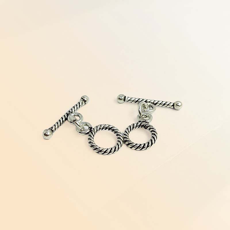Decorative Silver Overlay toggle clasp with twisted rope pattern, round loop and bar design, oxidized finish, artisan jewelry fastener for necklaces and bracelets.