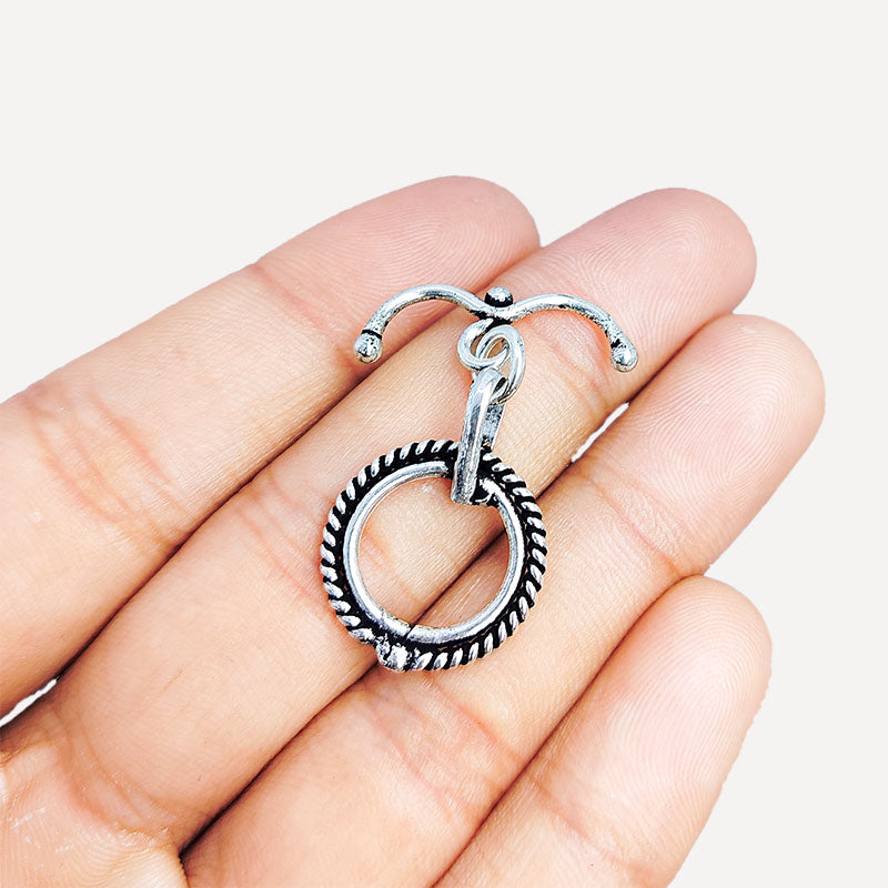 Decorative Silver Overlay toggle clasp with curved bar and rope-style circular loop, oxidized finish, artisan jewelry fastener for bracelets and necklaces.