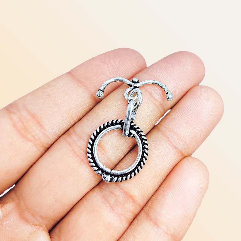 Decorative Silver Overlay toggle clasp with curved bar and rope-style circular loop, oxidized finish, artisan jewelry fastener for bracelets and necklaces.