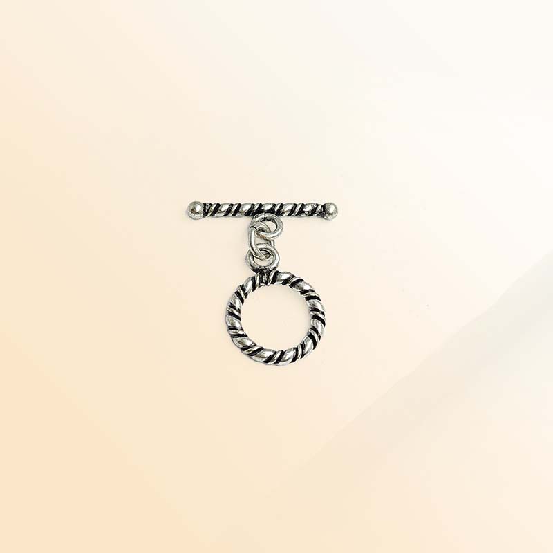 Decorative Silver Overlay toggle clasp with twisted rope bar and circular loop, oxidized finish, artisan jewelry fastener for bracelets and necklaces.