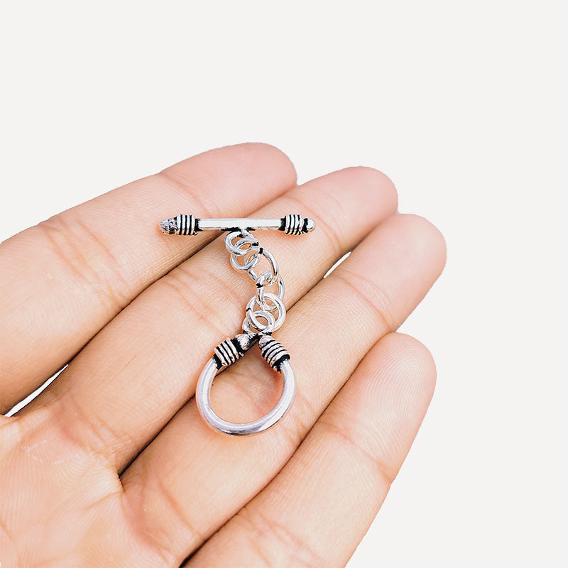 Decorative Silver Overlay toggle clasp with bar, chain link connector, and U-shaped ring, oxidized finish, artisan jewelry fastener for bracelets and necklaces.