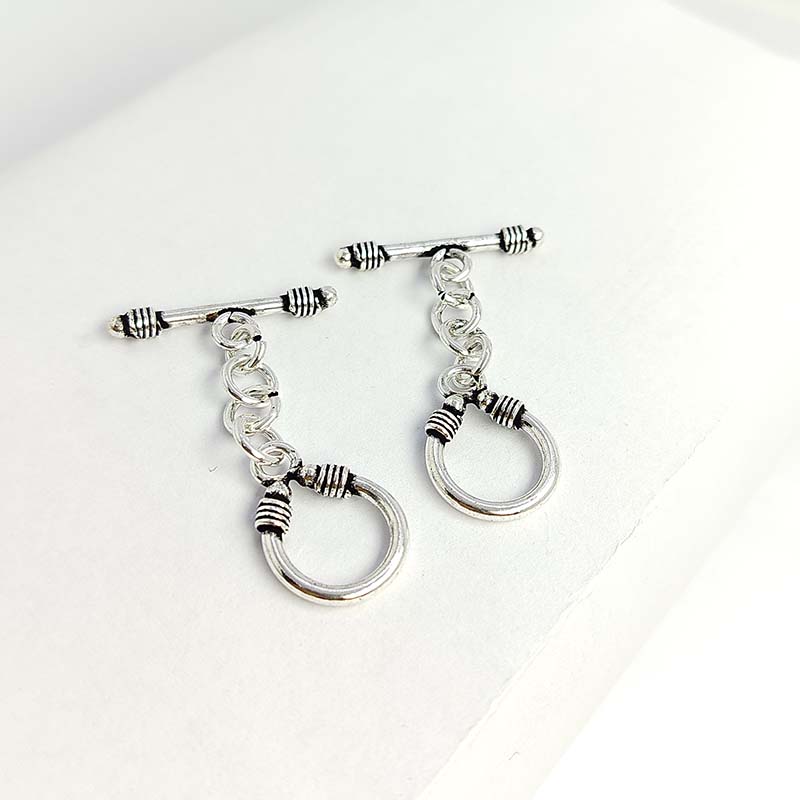 Decorative Silver Overlay toggle clasp with bar, chain link connector, and U-shaped ring, oxidized finish, artisan jewelry fastener for bracelets and necklaces.