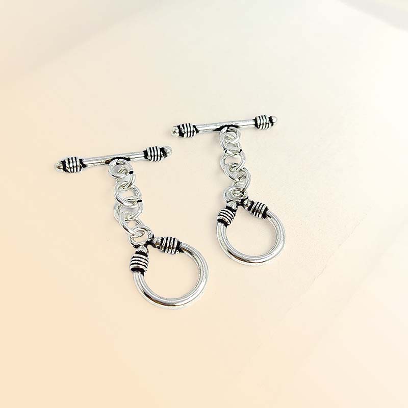 Decorative Silver Overlay toggle clasp with bar, chain link connector, and U-shaped ring, oxidized finish, artisan jewelry fastener for bracelets and necklaces.