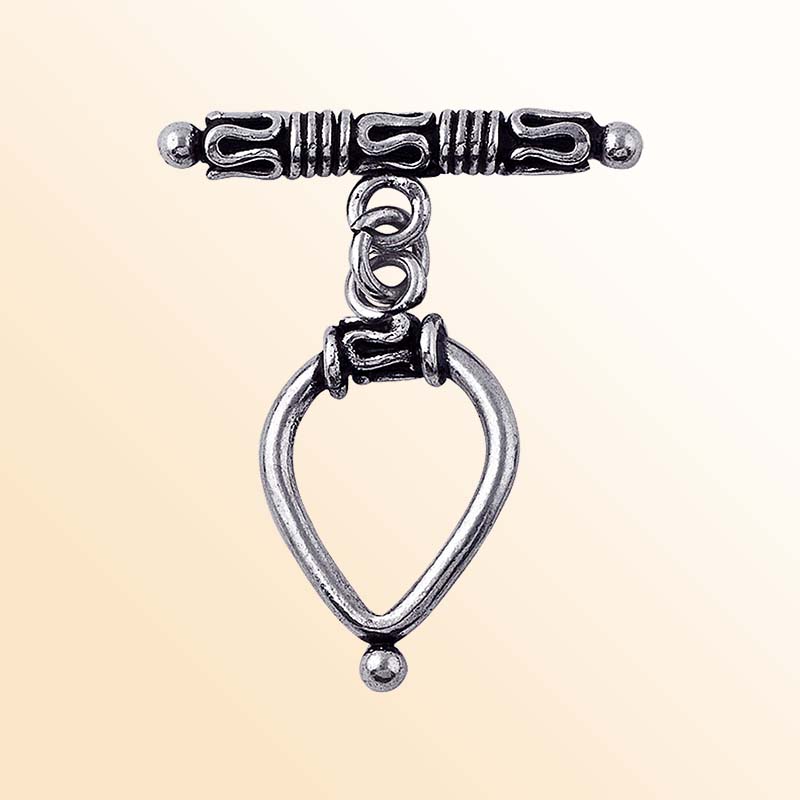 Bulk Silver Overlay teardrop toggle fastener with decorative bar, wholesale Bali jewelry finding for bracelets and necklaces.