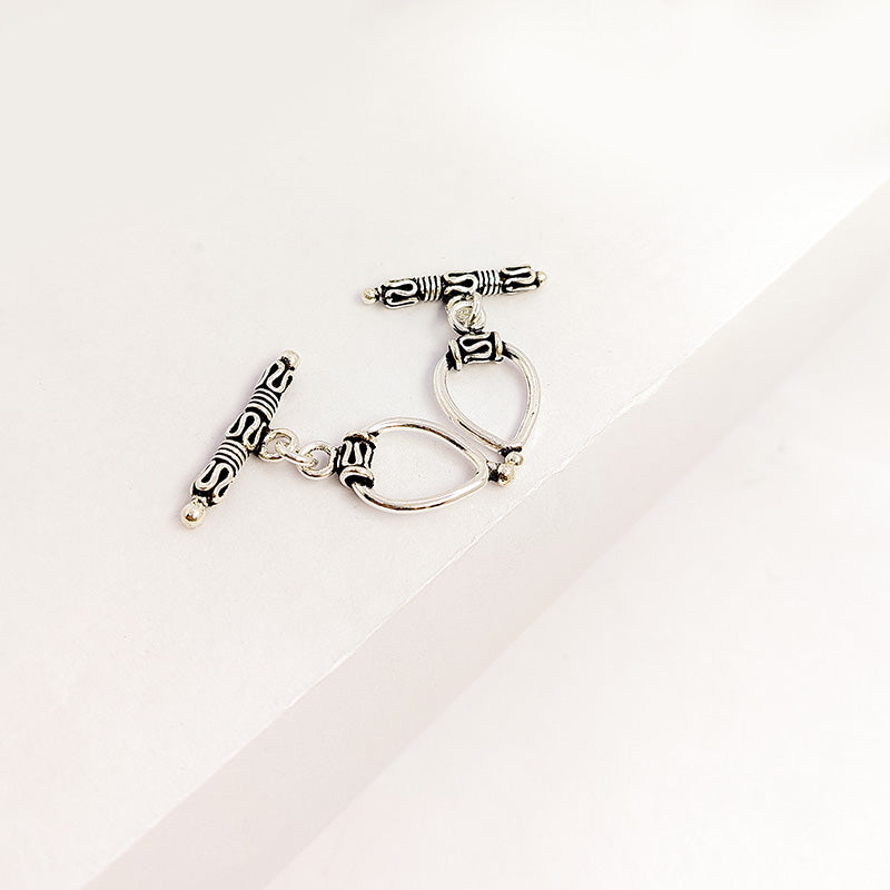 Bulk Silver Overlay teardrop toggle fastener with decorative bar, wholesale Bali jewelry finding for bracelets and necklaces.