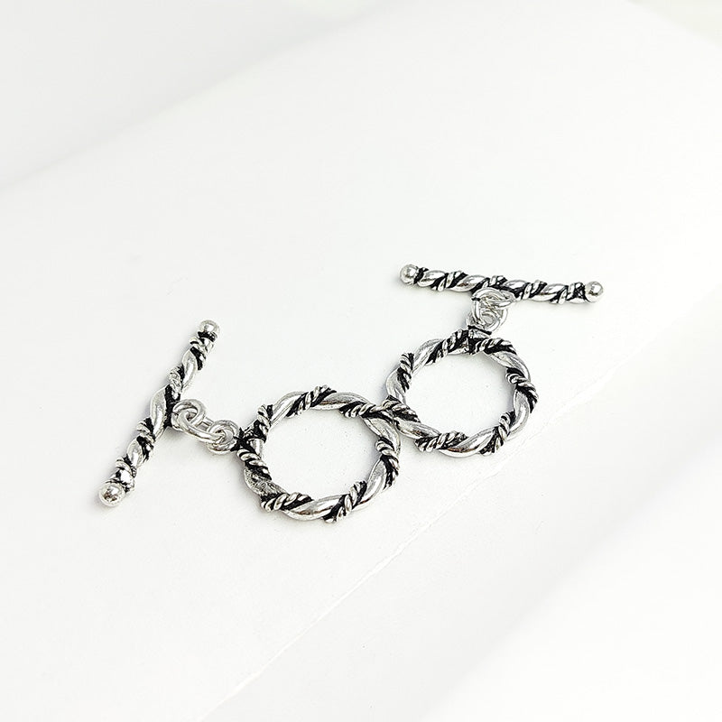 Handcrafted Silver Overlay rope-style toggle clasp – decorative jewelry connector for bracelets and necklaces.