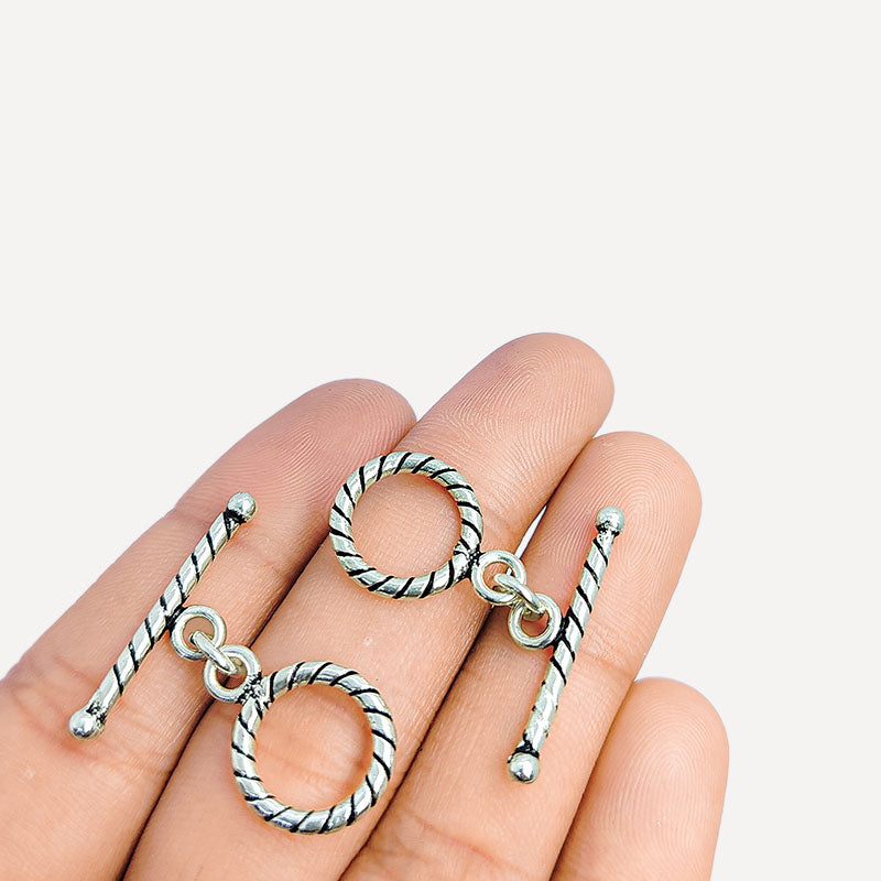 Handcrafted Silver Overlay twisted rope toggle clasp – decorative artisan jewelry connector for bracelets and necklaces.