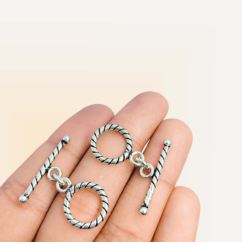Handcrafted Silver Overlay twisted rope toggle clasp – decorative artisan jewelry connector for bracelets and necklaces.