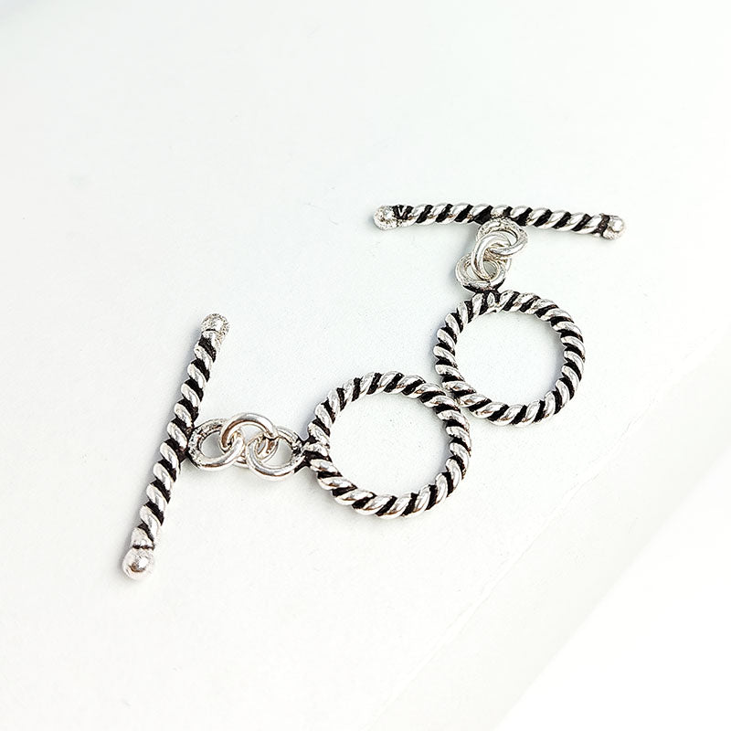 Antique Silver Overlay rope toggle clasp with twisted ring and textured bar, handcrafted Bali jewelry closure for bracelets and necklaces.