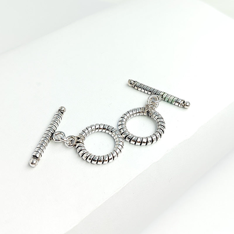 Antique Silver Overlay ridged toggle clasp with circular ring and textured bar, handcrafted Bali jewelry closure for necklaces and bracelets.