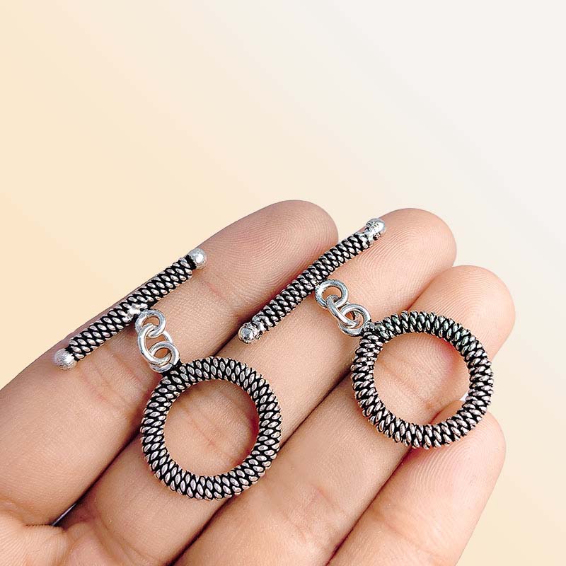 Handcrafted Antique Silver Overlay spiral toggle clasp with wire-wrapped ring and textured bar, Bali jewelry closure for necklaces and bracelets.
