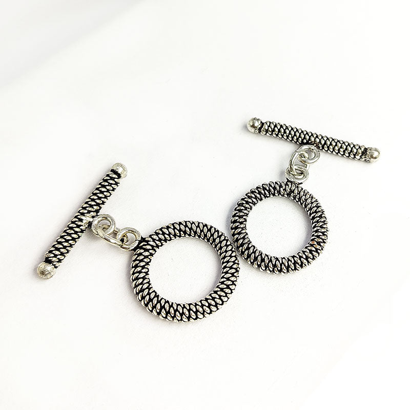 Handcrafted Antique Silver Overlay spiral toggle clasp with wire-wrapped ring and textured bar, Bali jewelry closure for necklaces and bracelets.