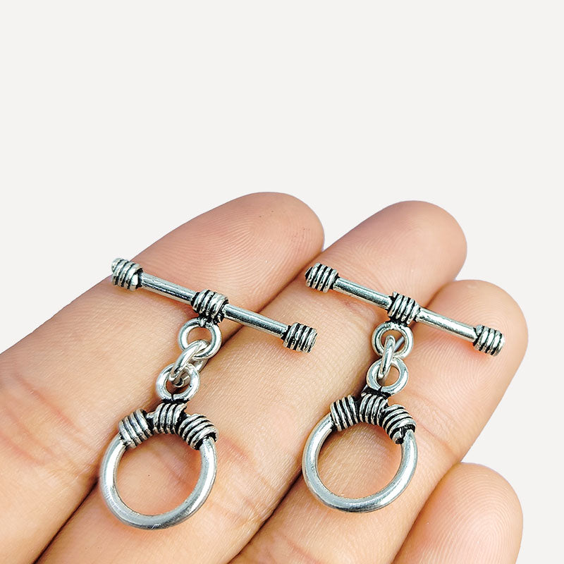 Handcrafted antique Silver Overlay toggle clasp with circular ring and wrapped wire details, Bali jewelry closure for necklaces and bracelets.