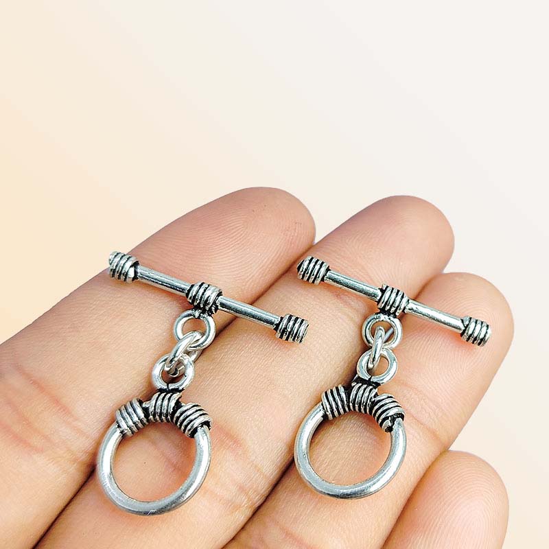 Handcrafted antique Silver Overlay toggle clasp with circular ring and wrapped wire details, Bali jewelry closure for necklaces and bracelets.