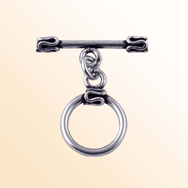 Handcrafted antique Silver Overlay toggle clasp with circular ring and folded edge detailing, Bali jewelry closure for necklaces and bracelets.