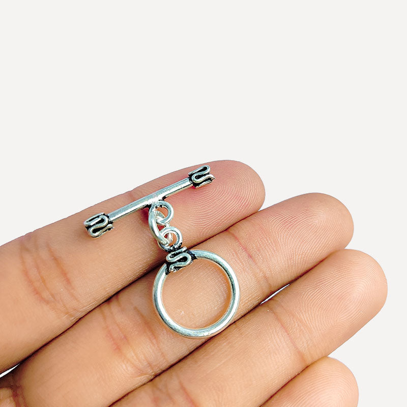 Handcrafted antique Silver Overlay toggle clasp with circular ring and folded edge detailing, Bali jewelry closure for necklaces and bracelets.