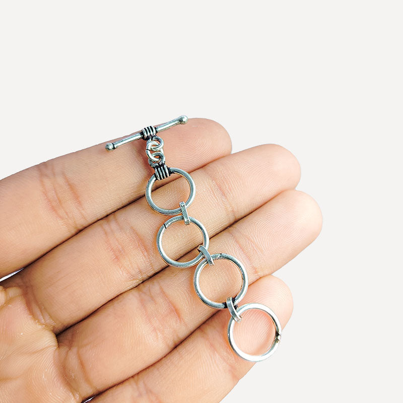 Elegant Silver Overlay toggle clasp with four smooth interlinked rings and a polished bar closure, perfect for bracelets, necklaces, and DIY jewelry projects.