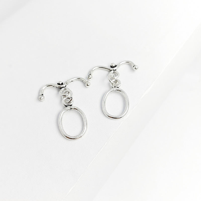Elegant oval Silver Overlay toggle clasp with smooth curved bar, ideal for DIY bracelets, necklaces, and handmade jewelry projects.