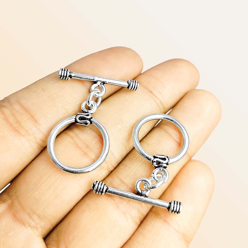 Classic Silver Overlay round toggle clasp with smooth ring and bar closure, ideal for DIY bracelets, necklaces, and handmade jewelry projects.