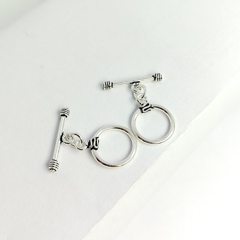 Classic Silver Overlay round toggle clasp with smooth ring and bar closure, ideal for DIY bracelets, necklaces, and handmade jewelry projects.