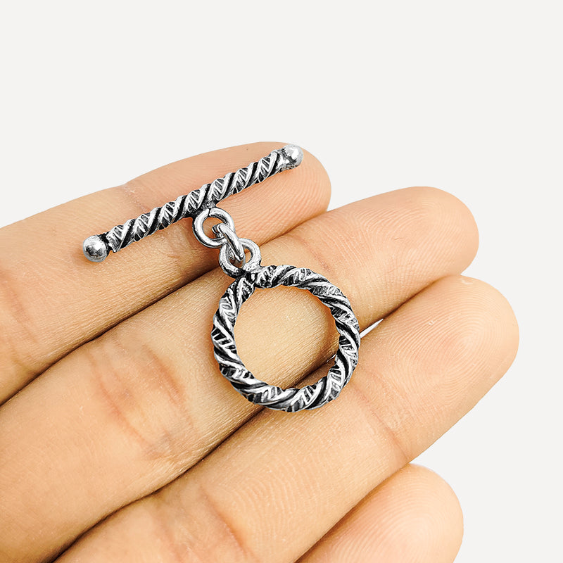 Elegant Silver Overlay oval toggle clasp, handcrafted in Bali – textured loop and bar closure for necklaces and bracelets.