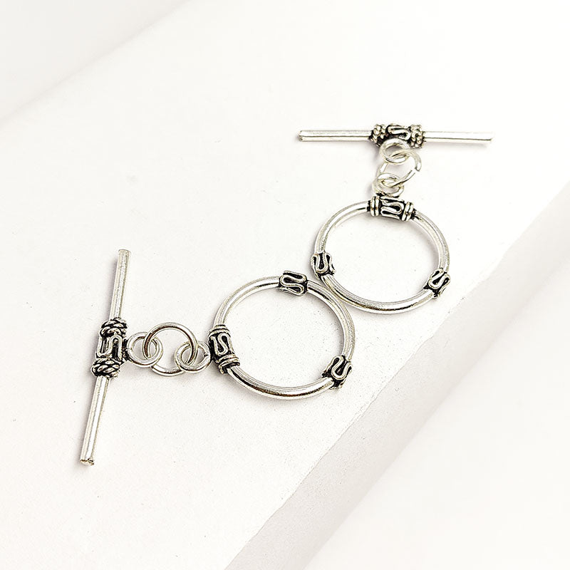 Elegant Silver Overlay decorative oval toggle clasp, handcrafted in India – polished loop and bar closure for necklaces and bracelets.