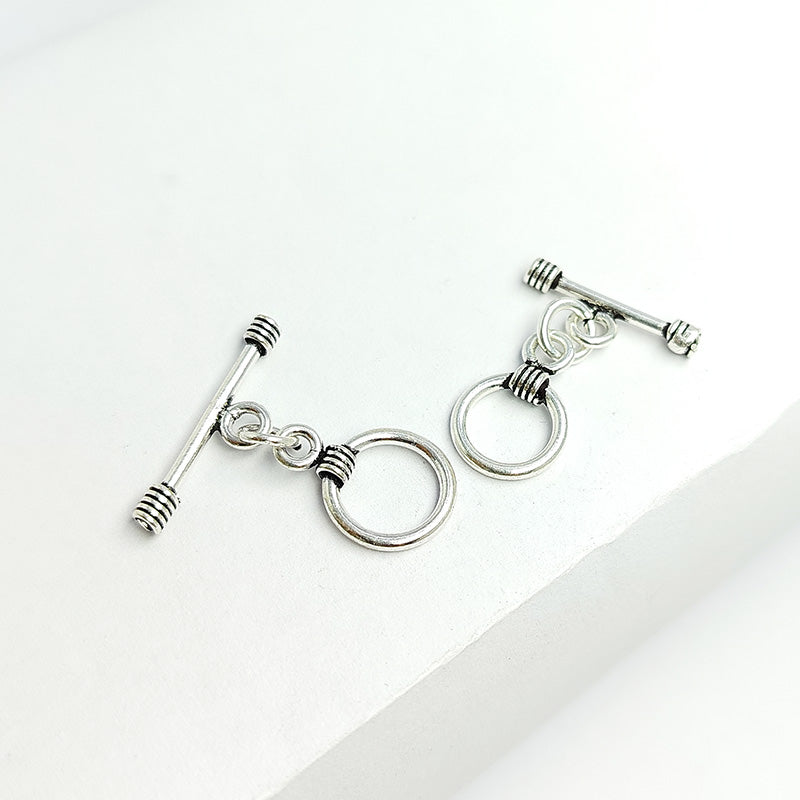 Polished Silver Overlay toggle closure with coil accents, handcrafted in India for bracelets and necklaces.