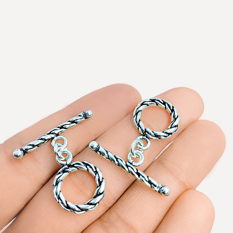 Polished Silver Overlay rope toggle closure with twisted design, handcrafted in India for bracelets and necklaces.