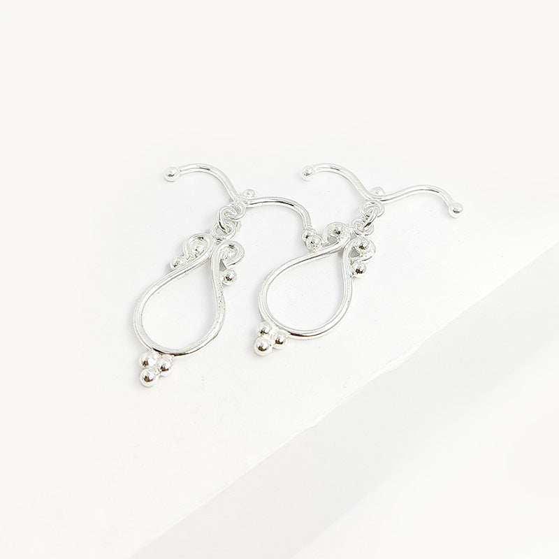 Elegant Silver Overlay toggle clasp with swirl-accented teardrop design, perfect for necklaces and bracelets, handcrafted in India.