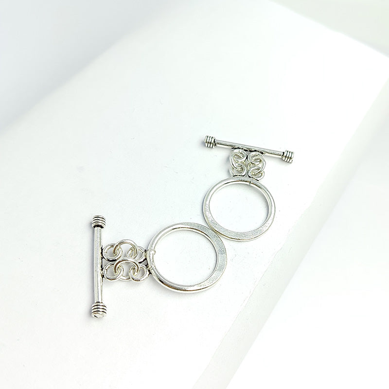 Elegant Silver Overlay round toggle clasp with swirl-accented design, perfect for necklaces and bracelets, handcrafted in India.