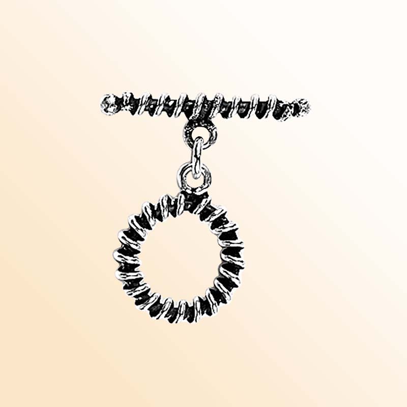 Elegant Silver Overlay textured toggle clasp with detailed circular loop and ridged bar design, perfect for necklaces and bracelets, handcrafted in India.