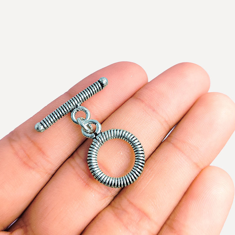 Elegant Silver Overlay coil round toggle clasp with detailed circular loop and matching bar design, perfect for necklaces and bracelets, handcrafted in India.