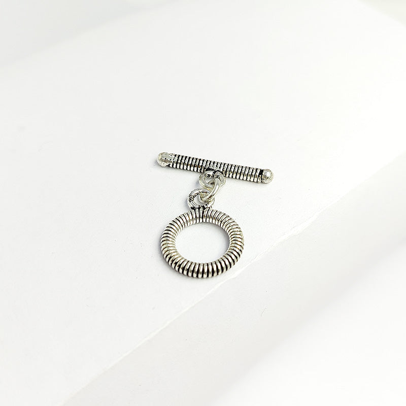 Elegant Silver Overlay coil round toggle clasp with detailed circular loop and matching bar design, perfect for necklaces and bracelets, handcrafted in India.