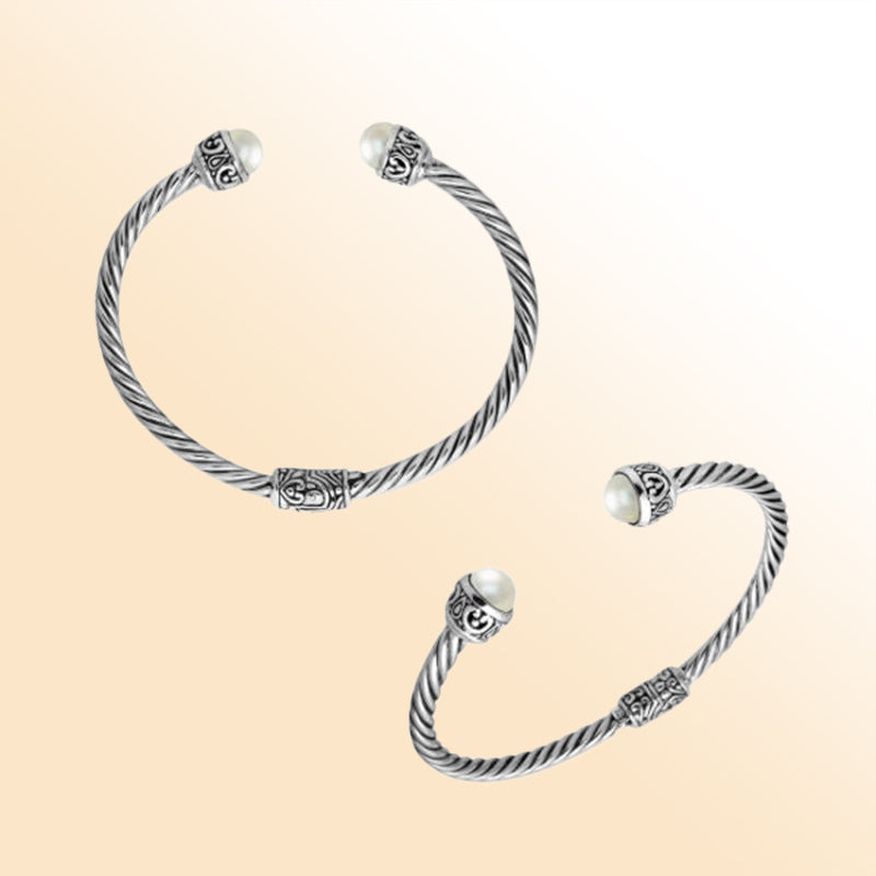 Sterling silver cuff bangle with luminous pearls and Balinese detailing, handmade in Bali.