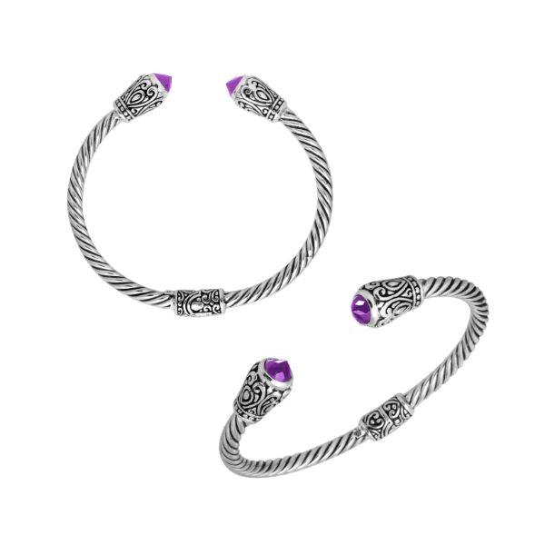 Handmade silver bangle with amethyst quartz ends and Balinese carved design