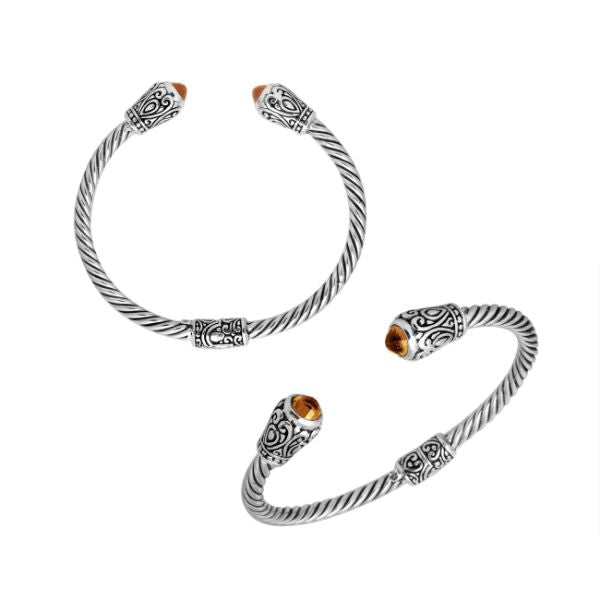 Handmade silver bangle with citrine quartz ends and Balinese carved design