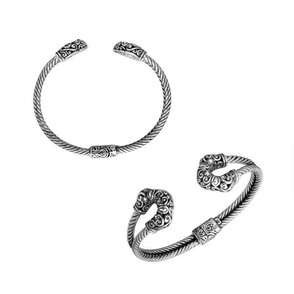 Handmade silver bangle with cubic zirconia ends and Balinese carved design