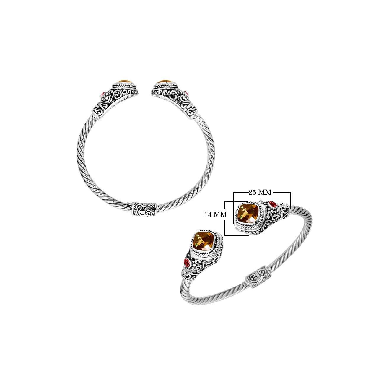 Handcrafted Sterling Silver bangle with Citrine Quartz and Garnet Quartz stones, artisan-made in Bali.