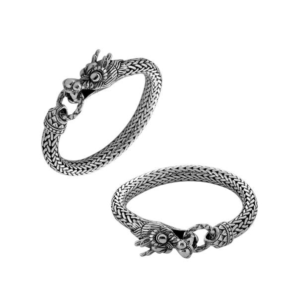 Single dragon head sterling silver braided bracelet with oxidized finish