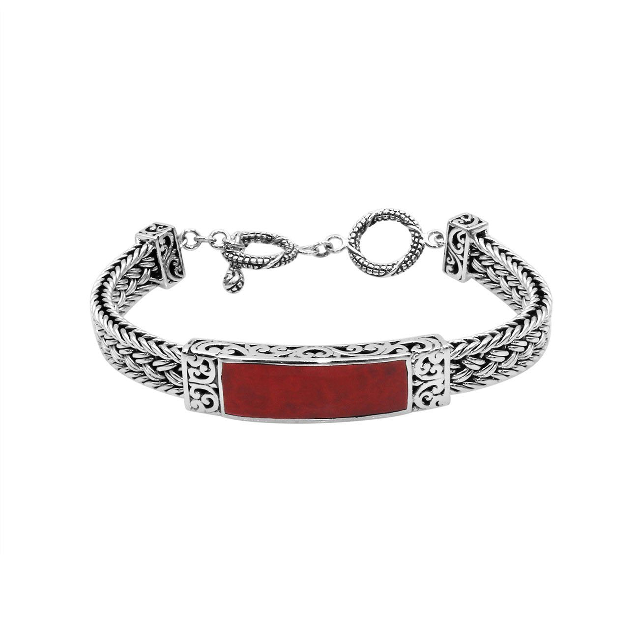 Handcrafted sterling silver bracelet with Coral inlay and toggle lock made in Bali.