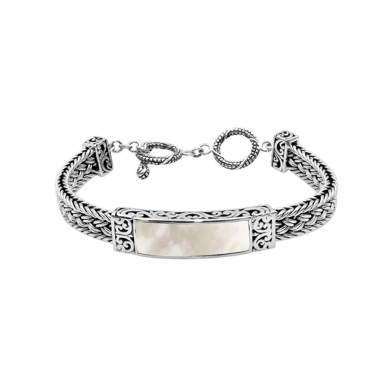 Handcrafted sterling silver bracelet with Mother Of Pearl inlay and toggle lock made in Bali.